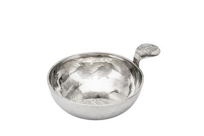 Lot 243 - A mid-18th century Dutch silver wine taster / child’s porringer, Amsterdam 1768, maker’s mark obliterated