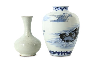 Lot 419 - A KOREAN CREAM GLAZED VASE TOGETHER WITH A BLUE AND WHITE JAR