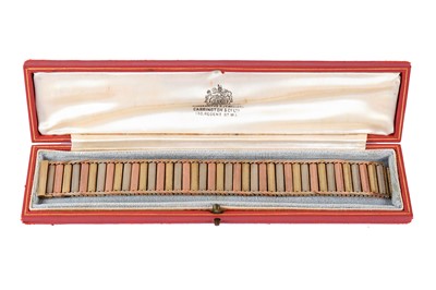 Lot 82 - A tri-coloured gold bracelet, 1989