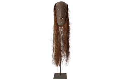 Lot 19 - A MID 20TH CENTURY PAPUA NEW GUINEA ANCESTOR MASK ON LATER STAND
