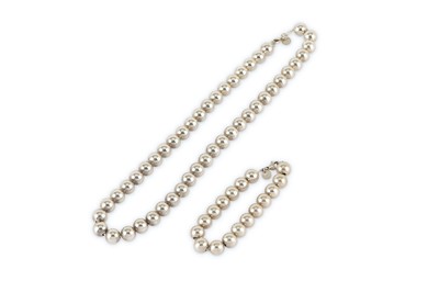 Lot 133 - A silver bead necklace and bracelet, by Tiffany & Co.