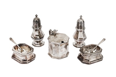 Lot 429 - A George V / Edward VIII sterling and Britannia standard silver seven piece cruet, all by Lionel Alfred Crichton