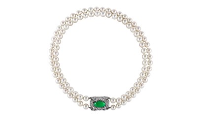 Lot 3 - A cultured pearl necklace and bracelet suite with jade and diamond clasps, circa 1950