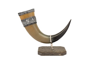 Lot 408 - An early to mid – 20th century Indian unmarked silver mounted cow horn, Trichinopoly circa 1920-50