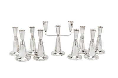 Lot 532 - An Elizabeth II sterling silver modernist candlestick suite, Birmingham 1965 by David Lawrence Silverware