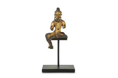 Lot 452 - A CHINESE GILT-BRONZE FIGURE OF GREEN TARA.