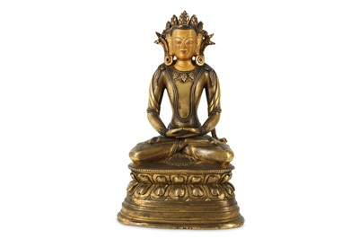 Lot 453 - A SINO-TIBETAN GILT-BRONZE FIGURE OF A BODHISATTVA.