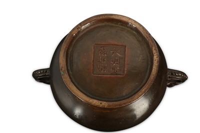 Lot 71 - A CHINESE BRONZE 'RAMS' INCENSE BURNER.