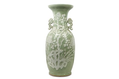Lot 322 - A LARGE CHINESE CELADON-GLAZED SLIP-DECORATED 'PEONY' VASE.