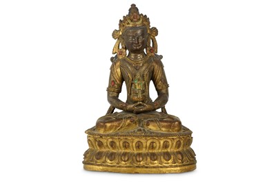 Lot 455 - A CHINESE GILT-BRONZE FIGURE OF A BODHISATTVA..
