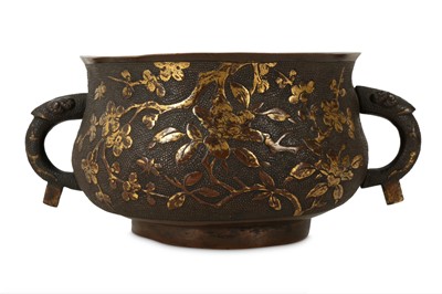 Lot 72 - A CHINESE PARCEL-GILT BRONZE 'BLOSSOMS' INCENSE BURNER.