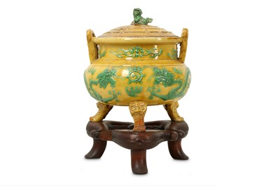 Lot 462 - A CHINESE GREEN AND YELLOW-GLAZED 'DRAGON' INCENSE BURNER AND COVER.