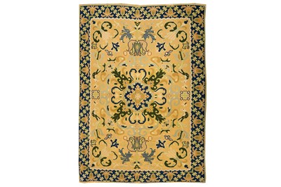 Lot 56 - A PORTUGUESE NEEDLEPOINT CARPET