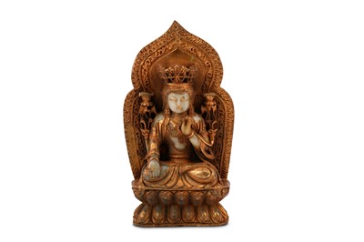 Lot 509 - A CHINESE PALE CELADON JADE GILT-DECORATED FIGURE OF GREEN TARA.
