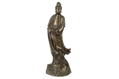 Lot 384 - A CHINESE BRONZE SILVER-INLAID 'SHI SOU' FIGURE OF GUANYIN.