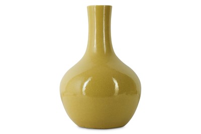 Lot 334 - A CHINESE CRACKLE-GLAZED YELLOW BOTTLE VASE.