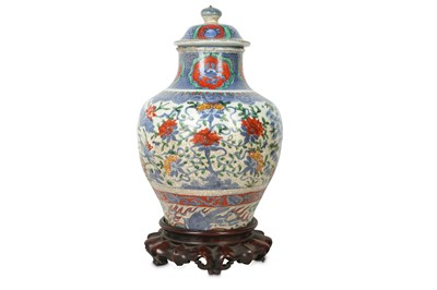 Lot 20 - A CHINESE BLUE AND WHITE ENAMELLED VASE AND COVER.