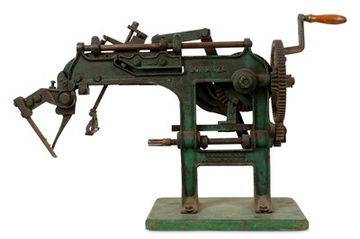 Lot 140 - A LATE 19TH CENTURY AMERICAN CAST IRON APPLE PEELING MACHINE