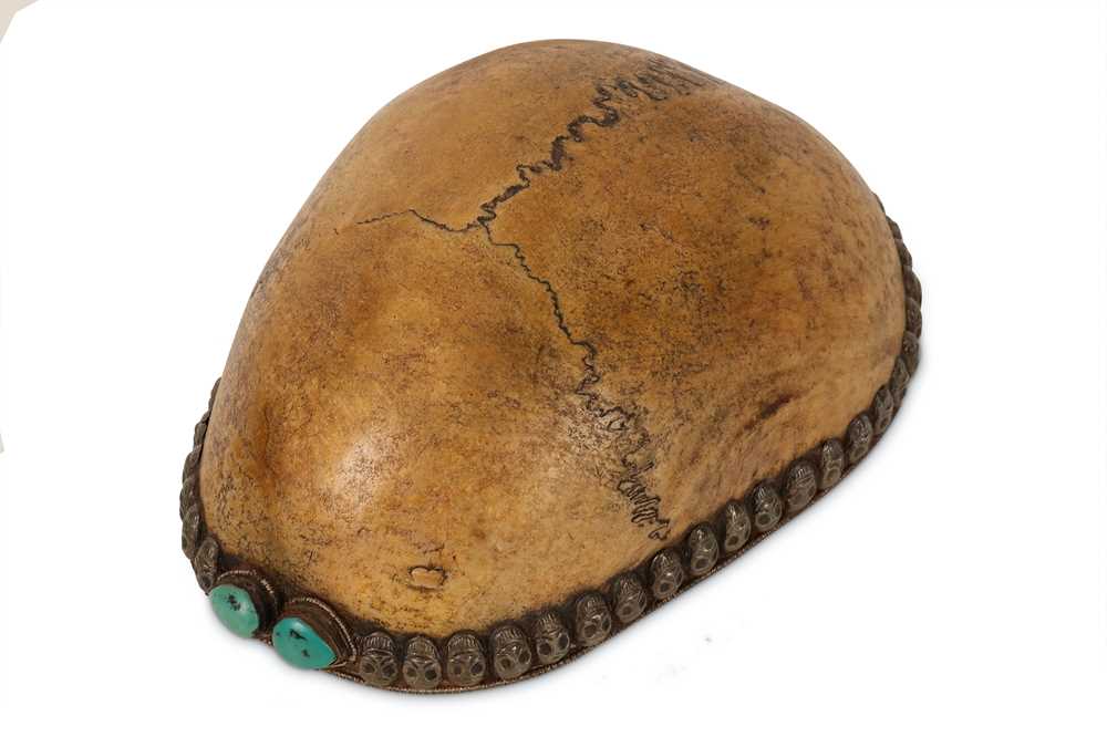 Lot 5 - A TIBETAN KAPALA SILVER LINED HUMAN SKULL CAP