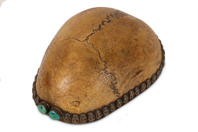 Lot 5 - A TIBETAN KAPALA SILVER LINED HUMAN SKULL CAP