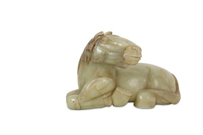 Lot 41 - A CHINESE PALE CELADON JADE CARVING OF A RECUMBENT HORSE.