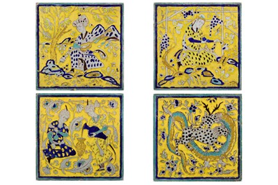 Lot 28 - * FOUR CUERDA SECA POTTERY TILES WITH FIGURAL SCENES