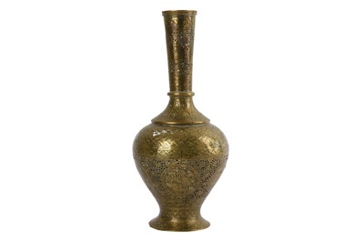 Lot 11 - * A PIERCED, ENGRAVED AND TURQUOISE-SET BRASS EWER