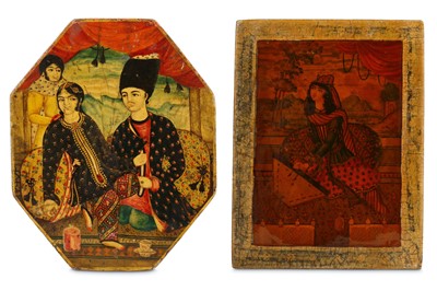 Lot 59 - * TWO SMALL QAJAR LACQUERED PAPIER-MÂCHÉ MIRROR CASE LIDS