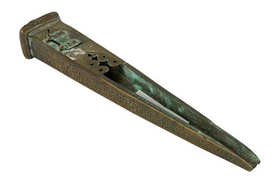 Lot 8 - * AN ENGRAVED BRASS PEN-CASE FRAGMENT