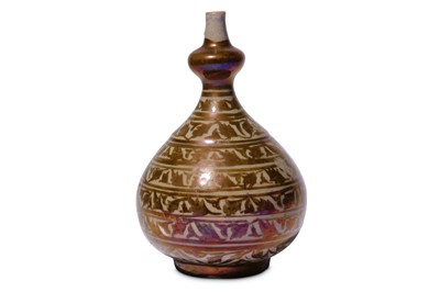 Lot 12 - * A SMALL SAFAVID COPPER-LUSTRE POTTERY BOTTLE