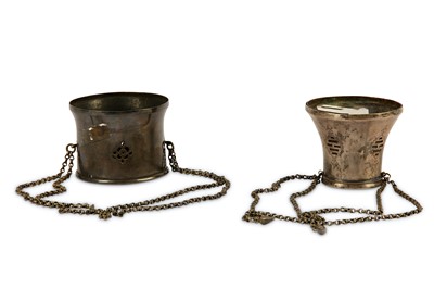 Lot 82 - * TWO QAJAR PIERCED SILVER QALYAN CUPS