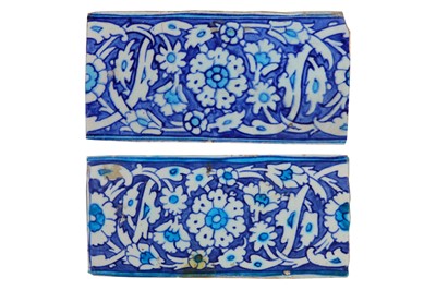 Lot 25 - * TWO BLUE AND WHITE IZNIK POTTERY FRIEZE TILES
