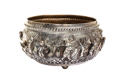 Lot 187 - A SILVER REPOUSSÉ FOOTED BURMESE BOWL