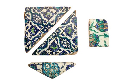 Lot 289 - FOUR DAMASCUS AND IZNIK POTTERY TILE FRAGMENTS