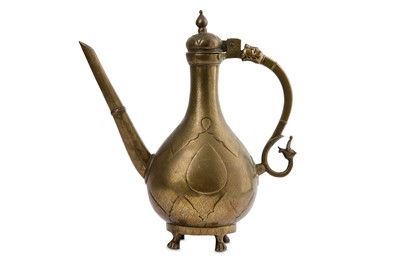 Lot 323 - AN ENGRAVED COPPER ALLOY EWER