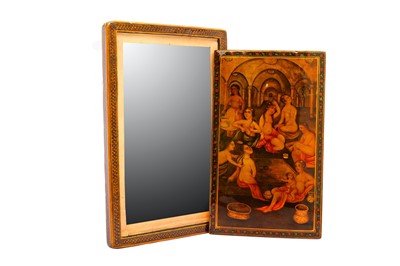 Lot 247 - A QAJAR LACQUERED PAPIER-MÂCHÉ MIRROR CASE WITH A HAMMAM SCENE