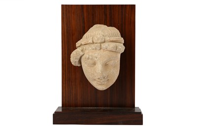 Lot 169 - A STUCCO BODHISATTVA HEAD WITH RED PIGMENT RESIDUES