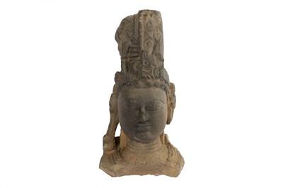 Lot 185 - A BUFF SANDSTONE CARVING OF HARIHARA
