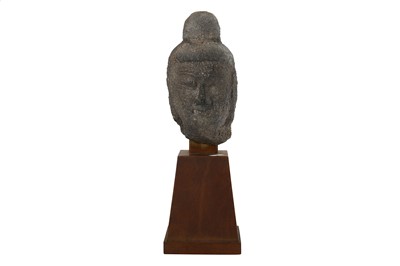 Lot 180 - A CARVED GRANITE ASIAN BUDDHA HEAD