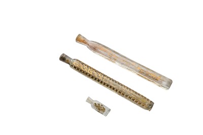 Lot 269 - THREE GILT CLEAR-GLASS PERFUME BOTTLES