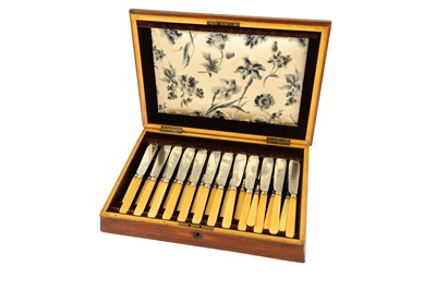 Lot 353 - A burr walnut canteen of silver plated fish knives and forks