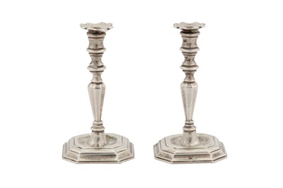 Lot 40 - A pair of mid-18th century Dutch silver miniature ‘toy’ cast candlesticks, Amsterdam 1758 by Arnoldus Van Geffen (active 1728-69)