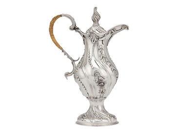 Lot 375 - A George III sterling silver ewer, London circa 1765 by I.B above W.B (unidentified, Grimwade 3626)