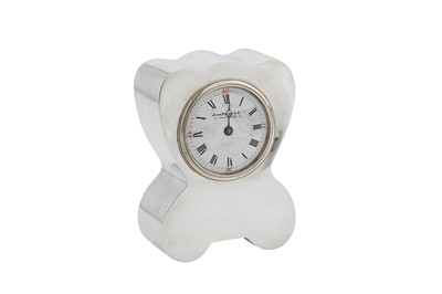 Lot 14 - An Edwardian sterling silver cased mantle timepiece, Birmingham 1902 by Douglas Clock Co