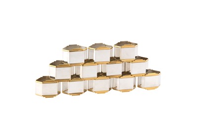 Lot 74 - A set of twelve modern German sterling silver parcel gilt napkin rings, circa 1990 by Robbe & Berking