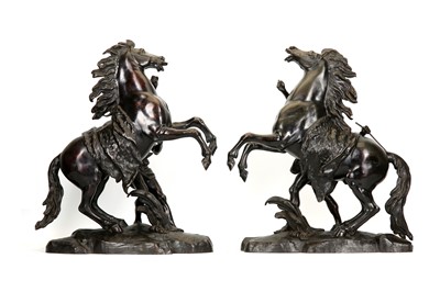 Lot 58 - A LARGE PAIR OF MID 19TH CENTURY FRENCH BRONZE MODELS OF THE MARLY HORSES AFTER THE MODELS BY GUILLAUME COUSTOU (FRENCH, 1677-1746)