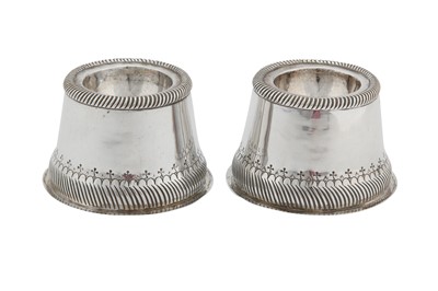 Lot 278 - A pair of Edwardian sterling silver ‘Arts and Crafts’ trencher salts, Birmingham 1908, marked for Millicent Sutherland, of the Duchess of Sutherland Cripples Guild