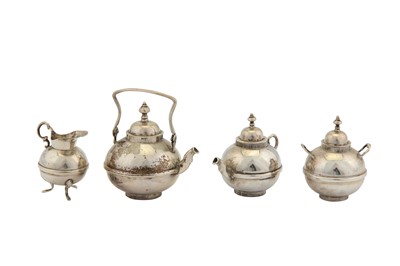 Lot 39 - A late 19th century Dutch silver miniature or ‘toy’ four-piece tea service, Groningen circa 1880