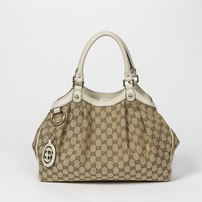 Lot 135 - Gucci Beige Monogram Sukey Tote PM