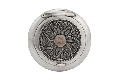 Lot 102 - A mid-20th century Iraqi unmarked niello and filigree silver compact, circa 1950 signed Omara, Saad